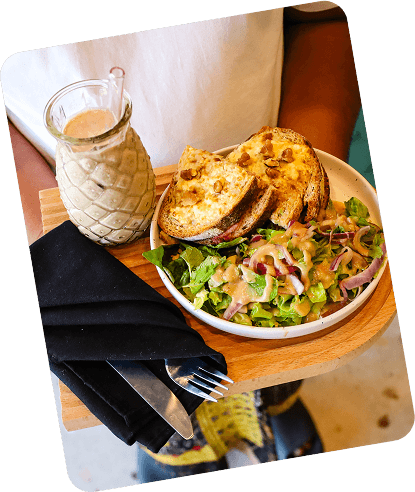 Customer enjoying coffee at Bonjour Laundry Bali